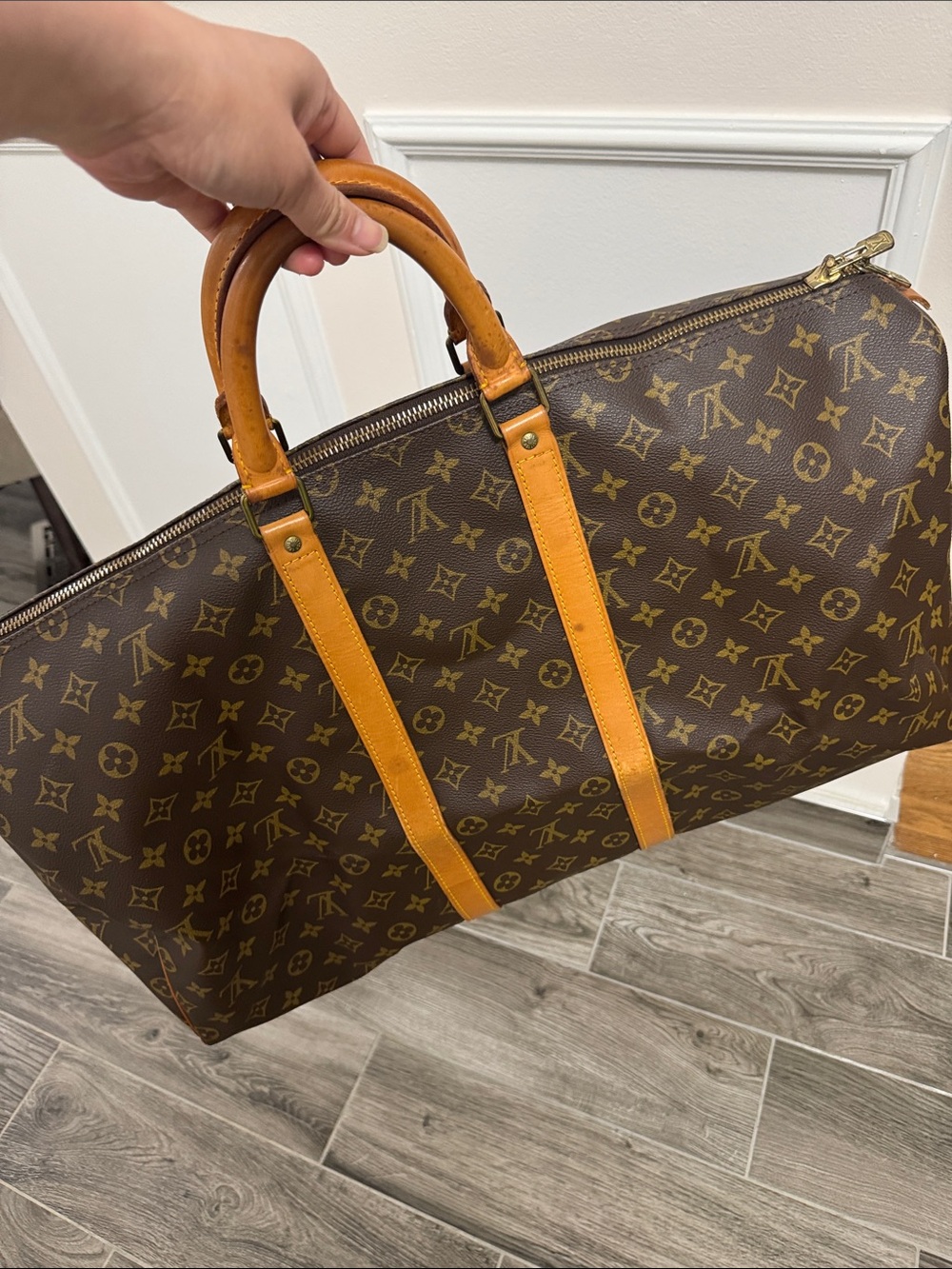 Authentic Louis Vuitton Monogram KEEPALL 55 in Monogram Canvas